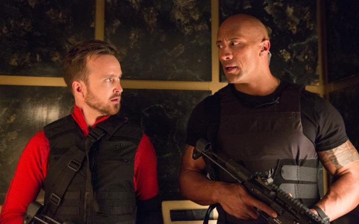 Dwayne Johnson y Aaron Paul en Un espía y medio Dwayne Johnson y Aaron Paul en Un espía y medio