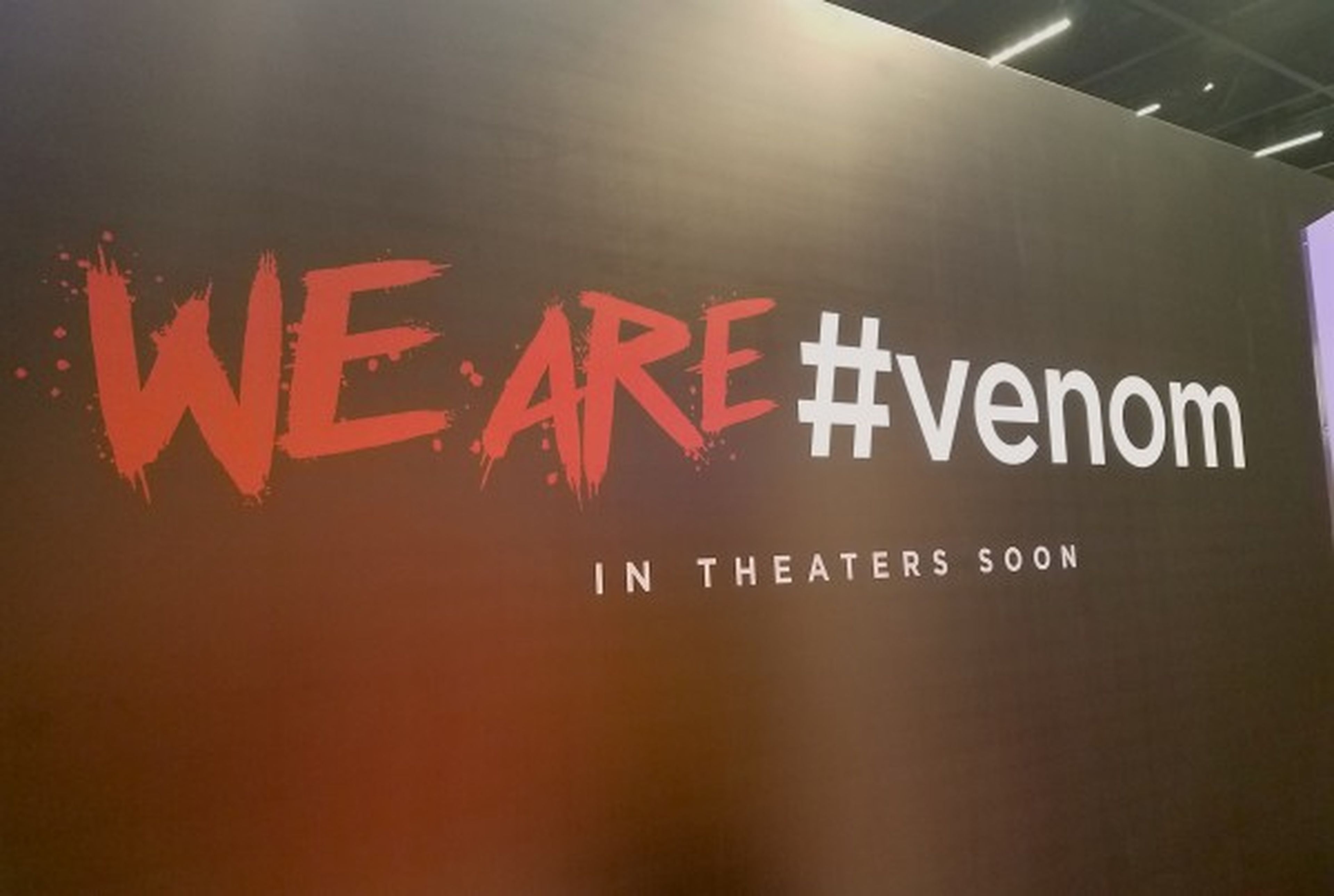 Venom logo y slogan