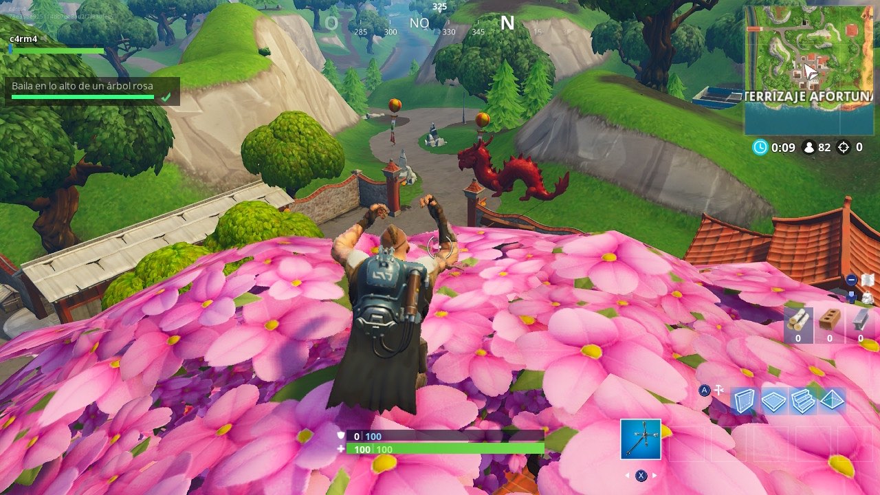 Baila en lo alto de una torre del reloj, un árbol rosa y un trono de porcelana en Fortnite Baila en lo alto de una torre del reloj, un árbol rosa y un trono de porcelana en Fortnite