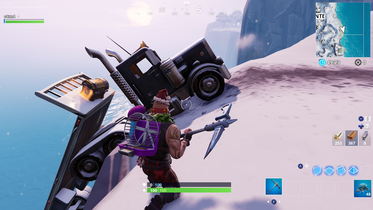 Busca en una escotilla misteriosa, una mujer de roca gigante y un camion accidentado Fortnite donde esta camion accidentado fortnite