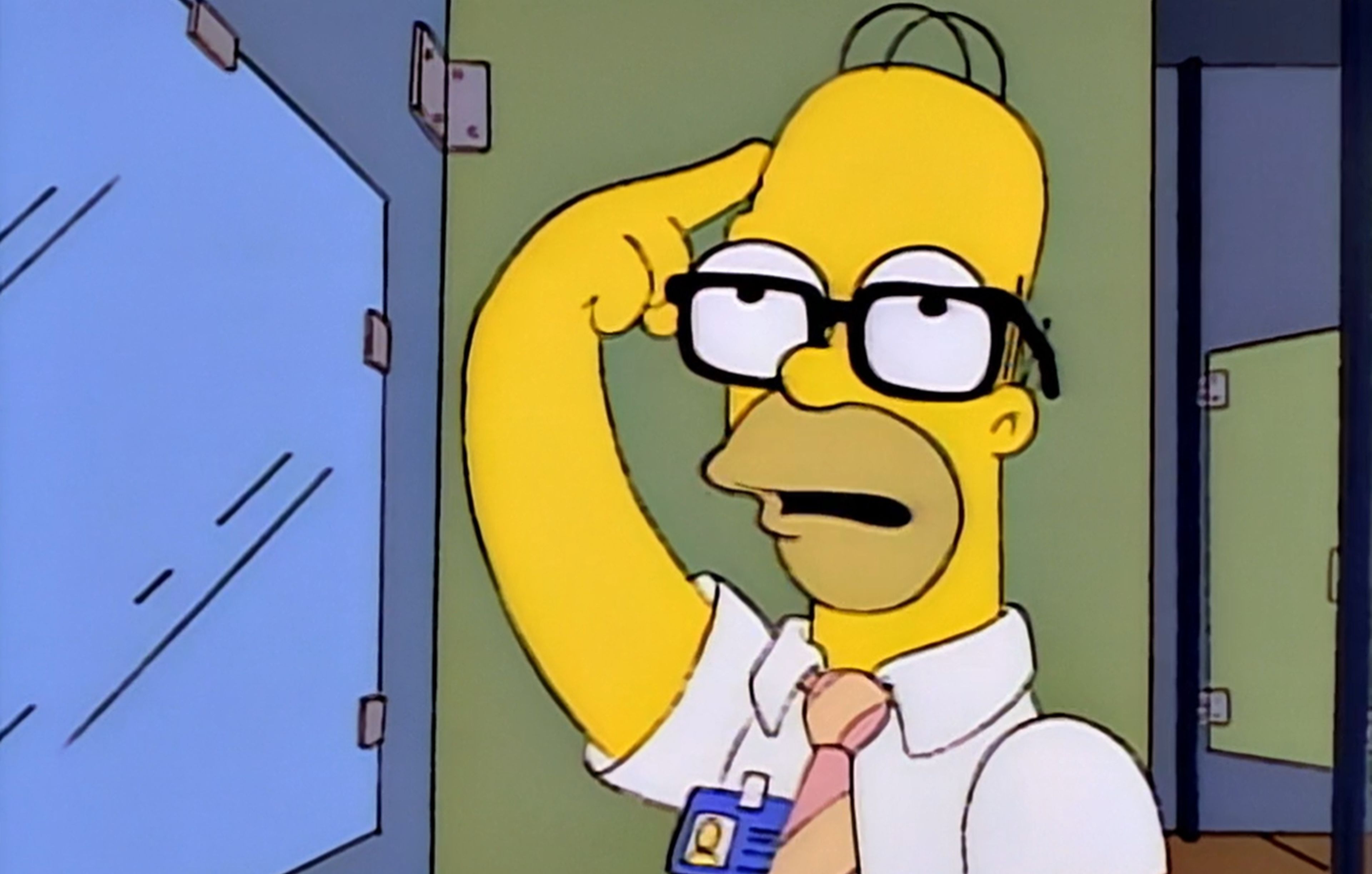 Homer Simpson con gafas de empollón