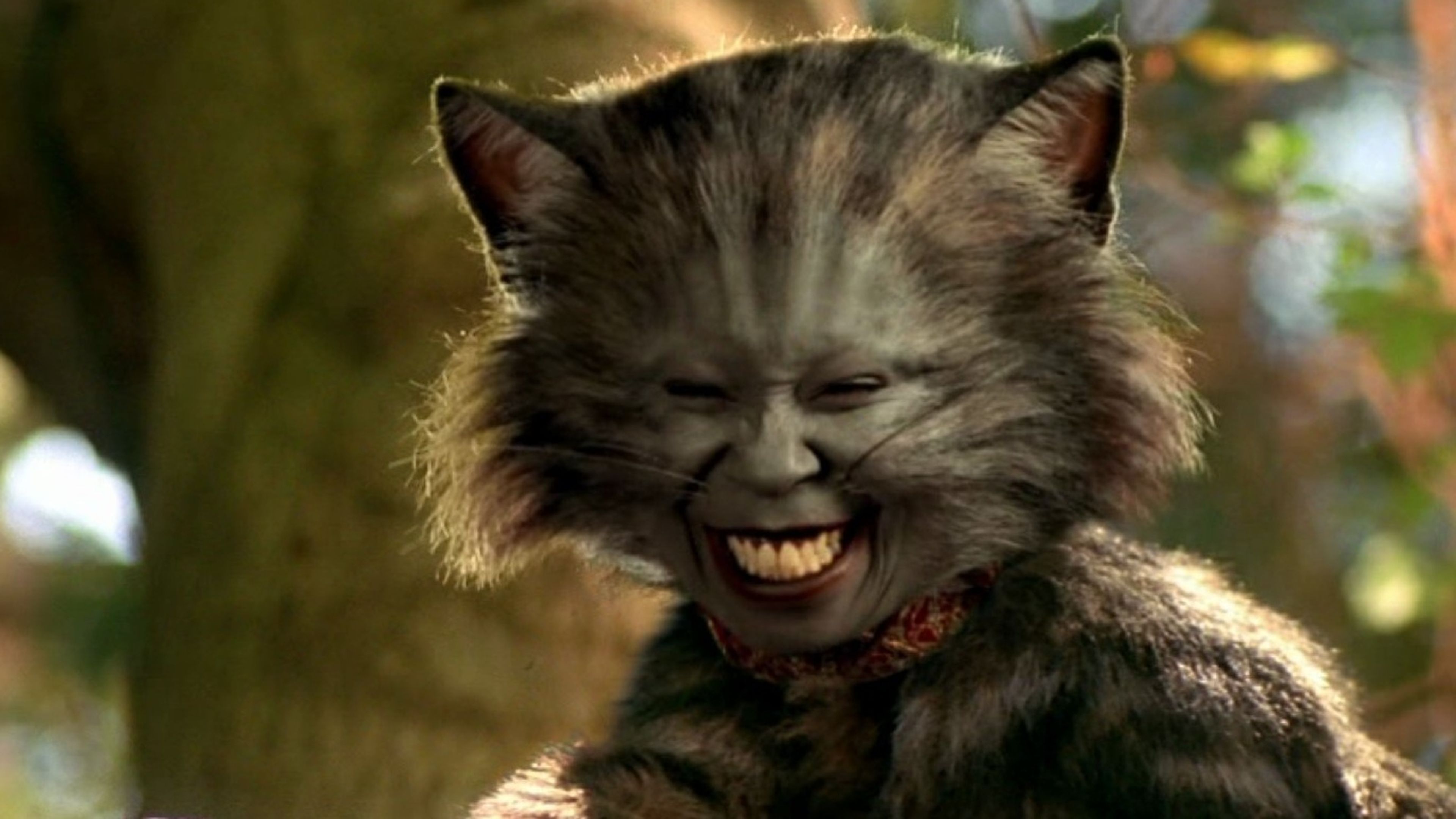 Whoopi Goldberg como el Gato de Cheshire en Alicia en el país de las maravillas (1999)