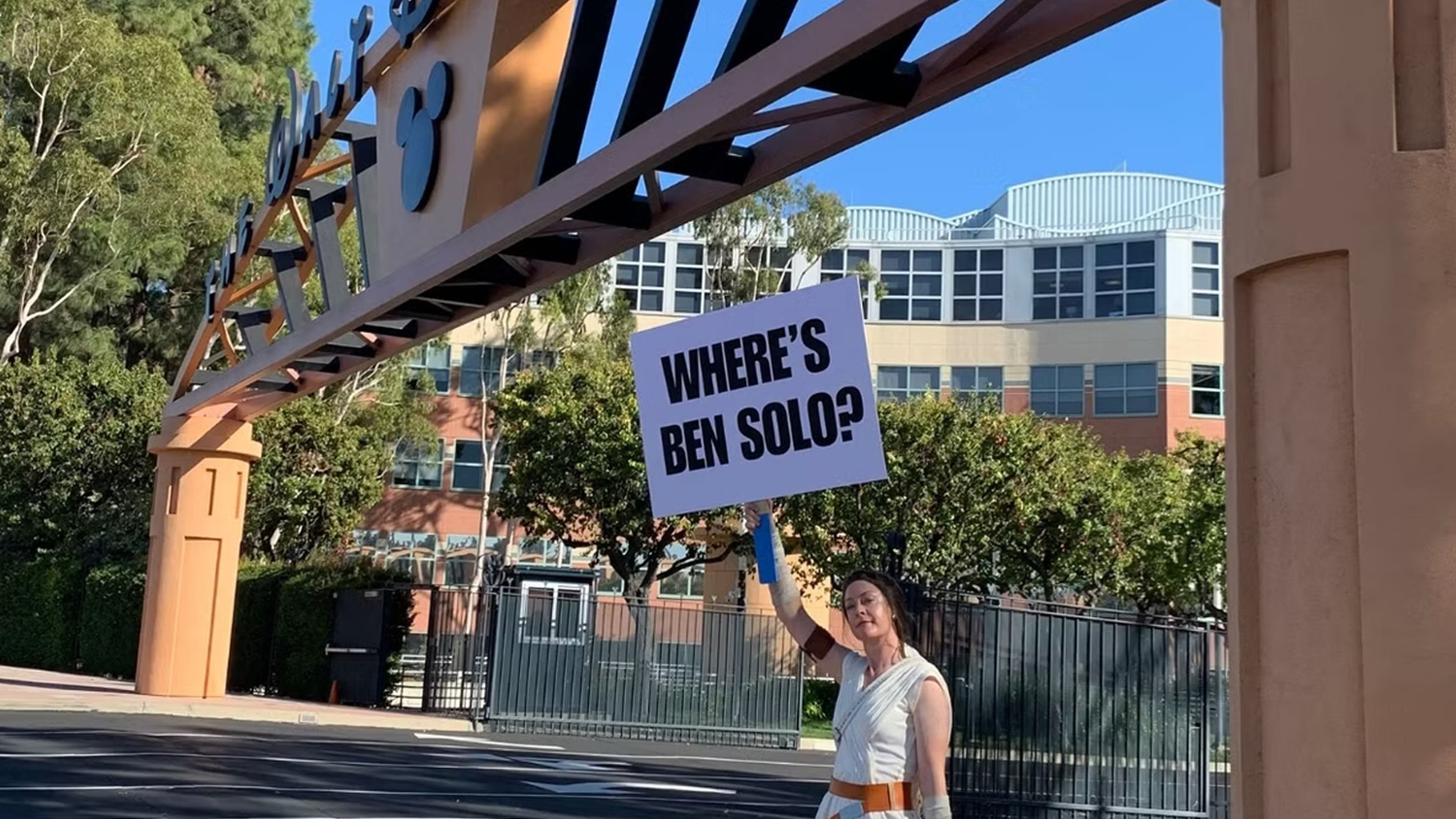 Protester dressed as a king in front of Disney studios